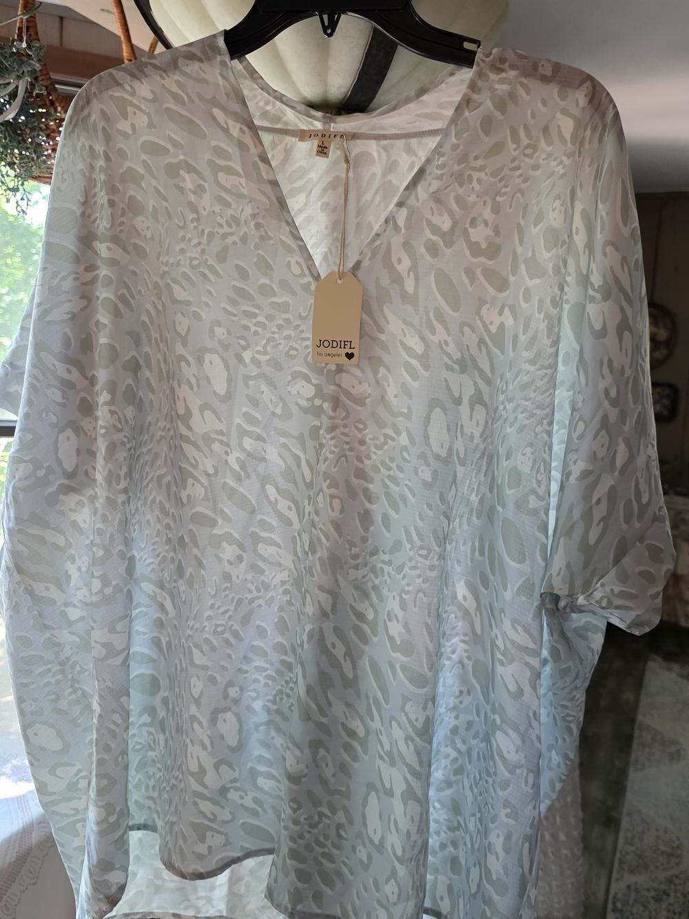 Jodifl Pale Mint Animal Print V-Neck Women's Top